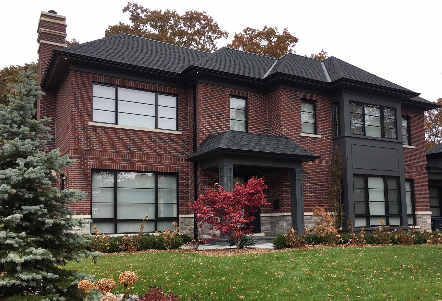 Red Brick House with Black Windows